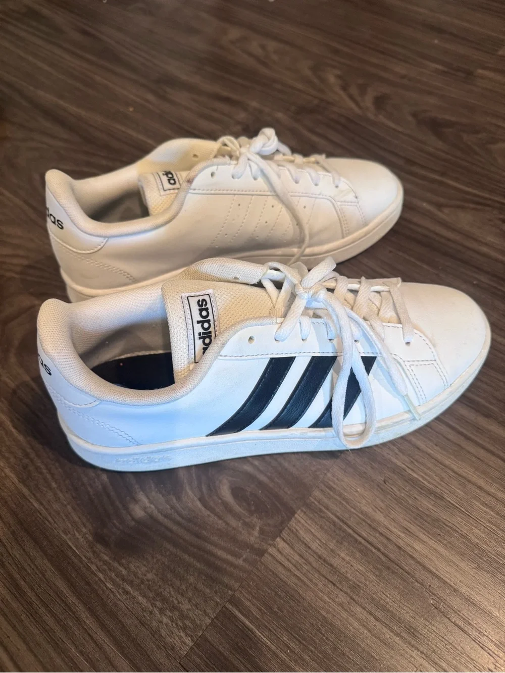 Adidas Women’s White Sneakers with Black Stripes